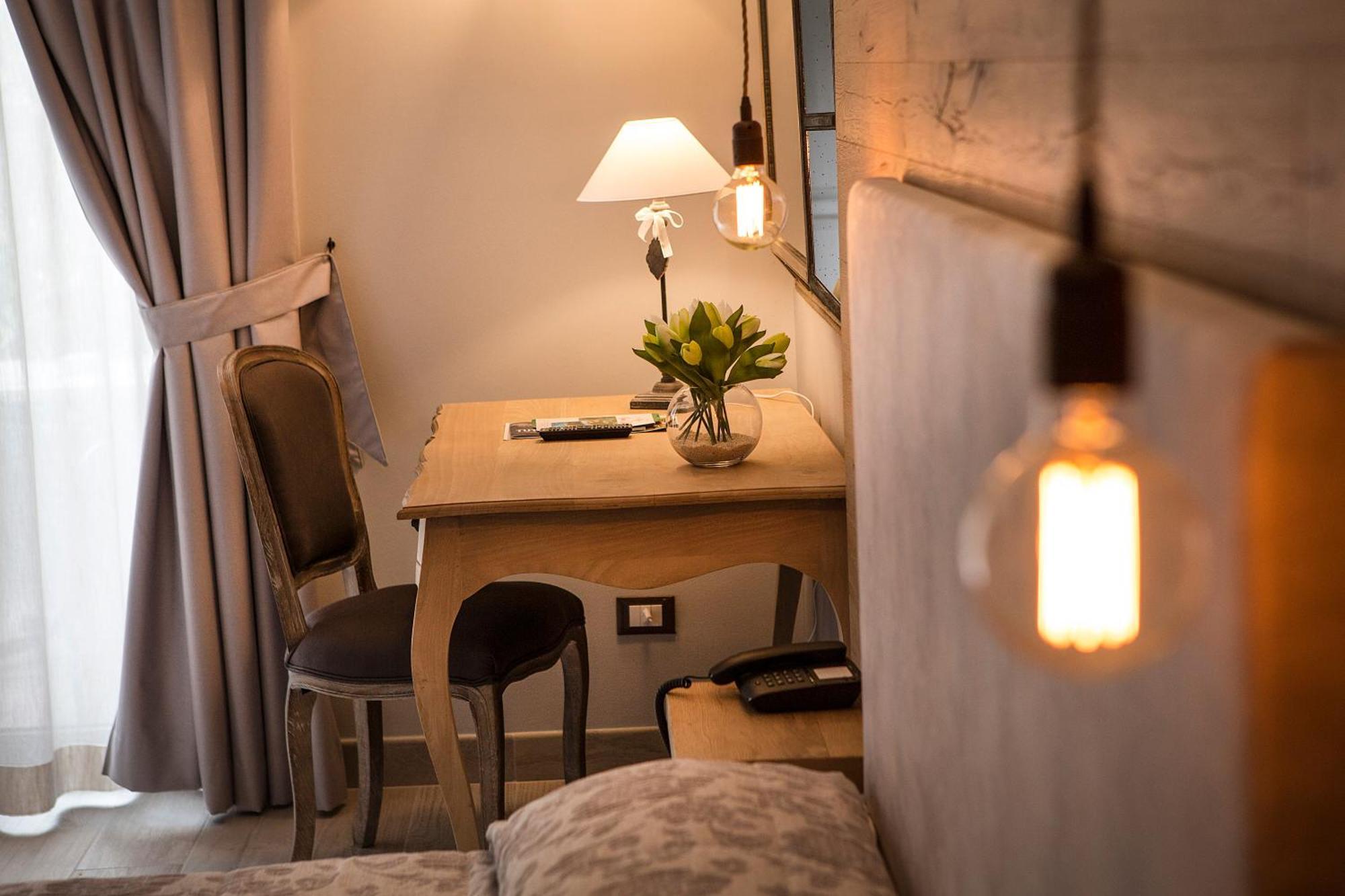Hotel Livia Гарньяно Номер фото