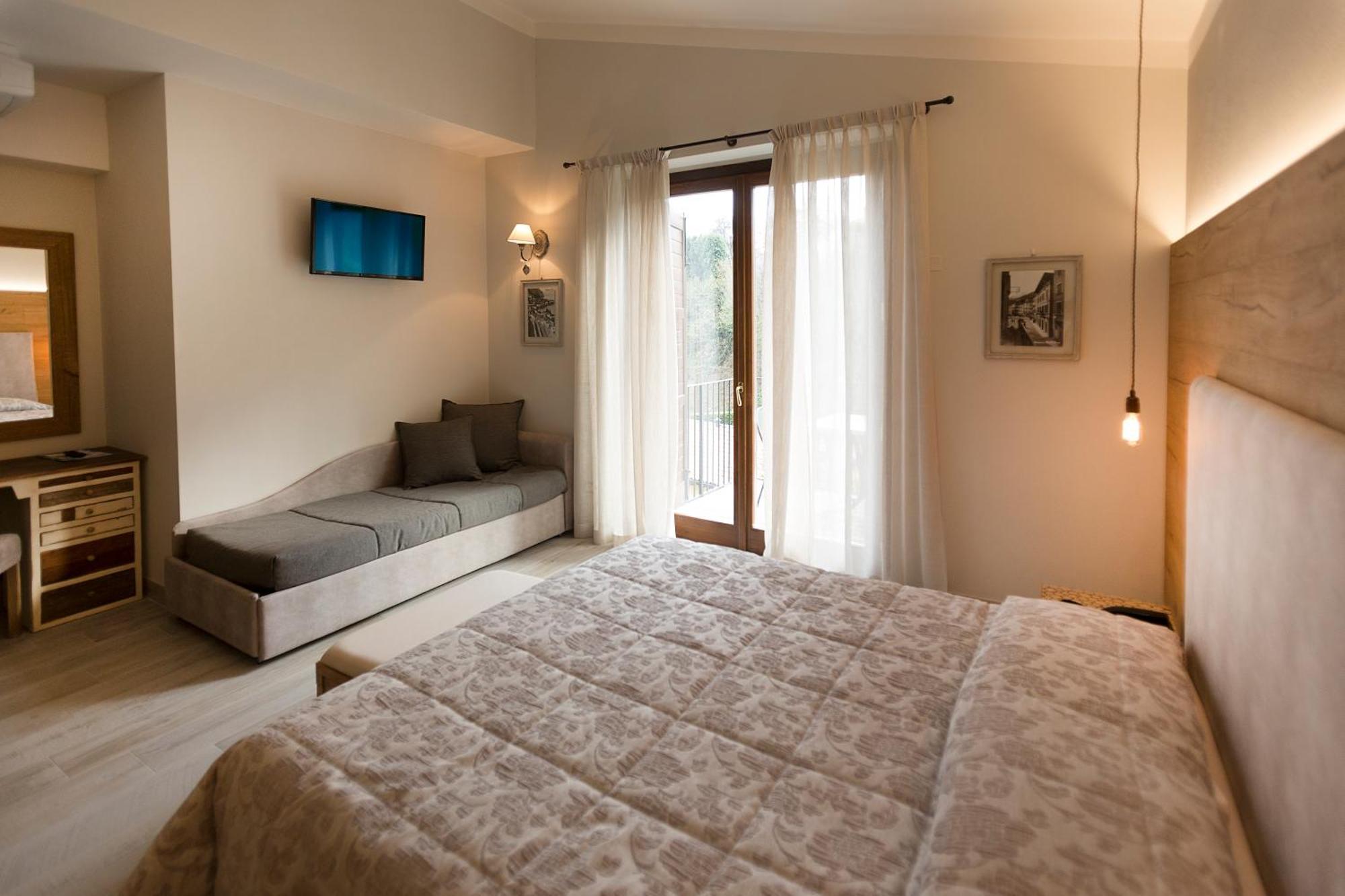 Hotel Livia Гарньяно Номер фото