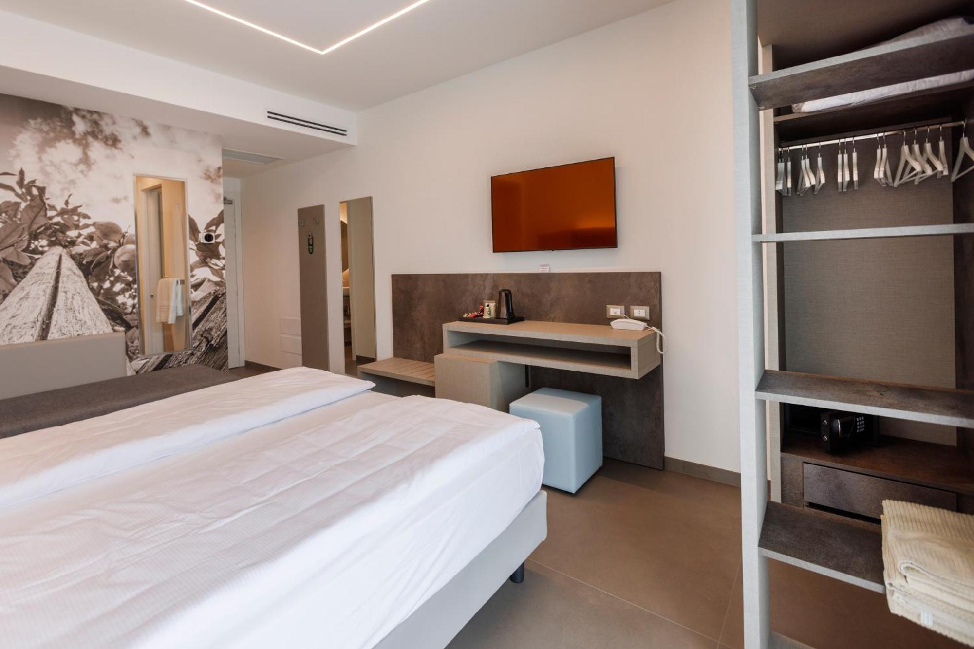 Hotel Livia Гарньяно Номер фото