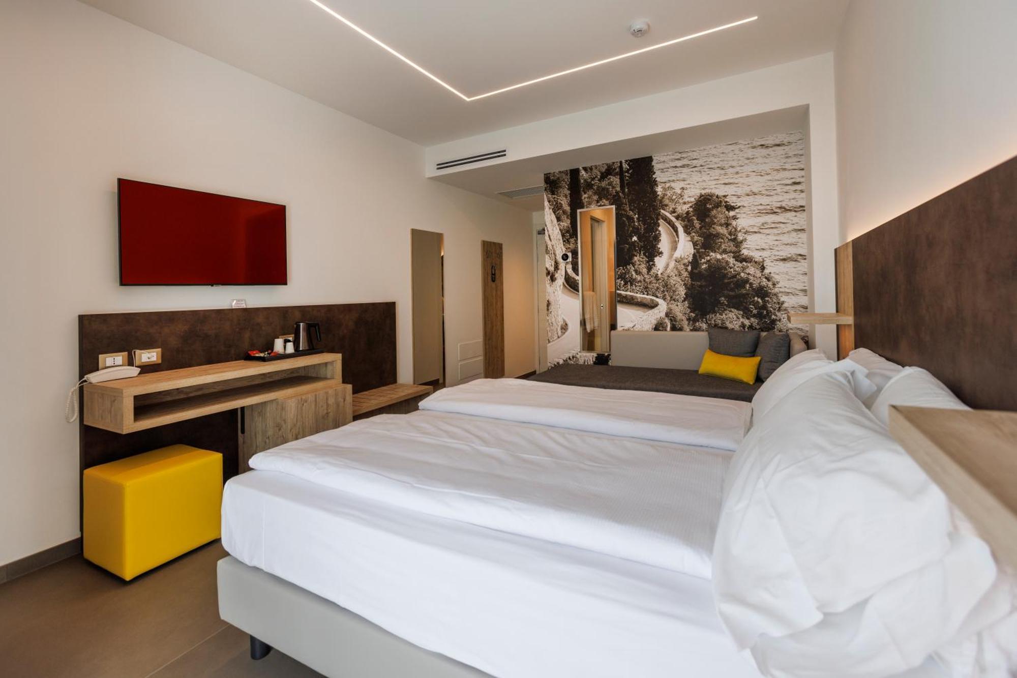 Hotel Livia Гарньяно Номер фото